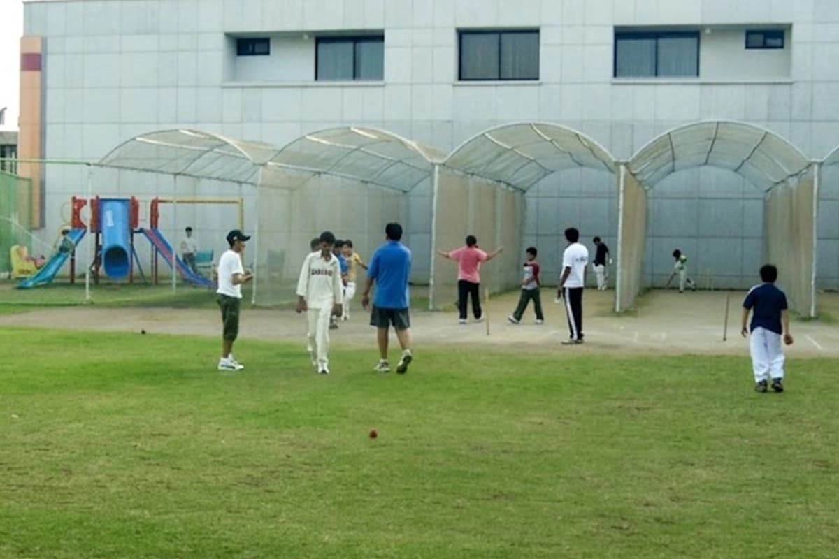 Children practising cricket at the stadium