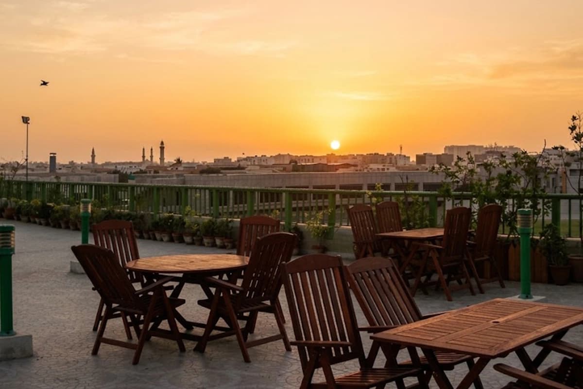 Rooftop bbq area sunset skyline