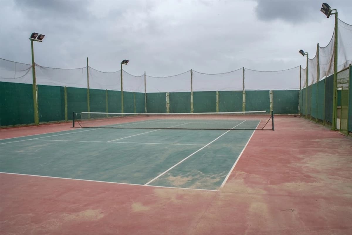 Tennis court playing surface